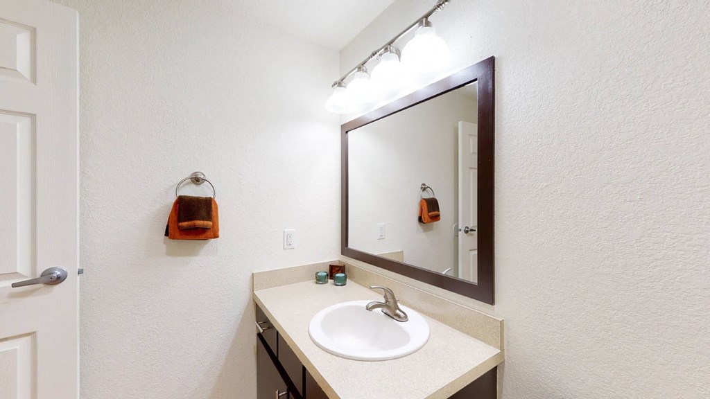 Bathroom with white interior at North Creek Apartments, Everett, WA, 98208
