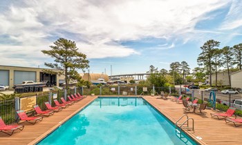 Poolside Sundeck Poolside Sundeck at River Crossing Apartments, Thunderbolt, GA - Photo Gallery 6