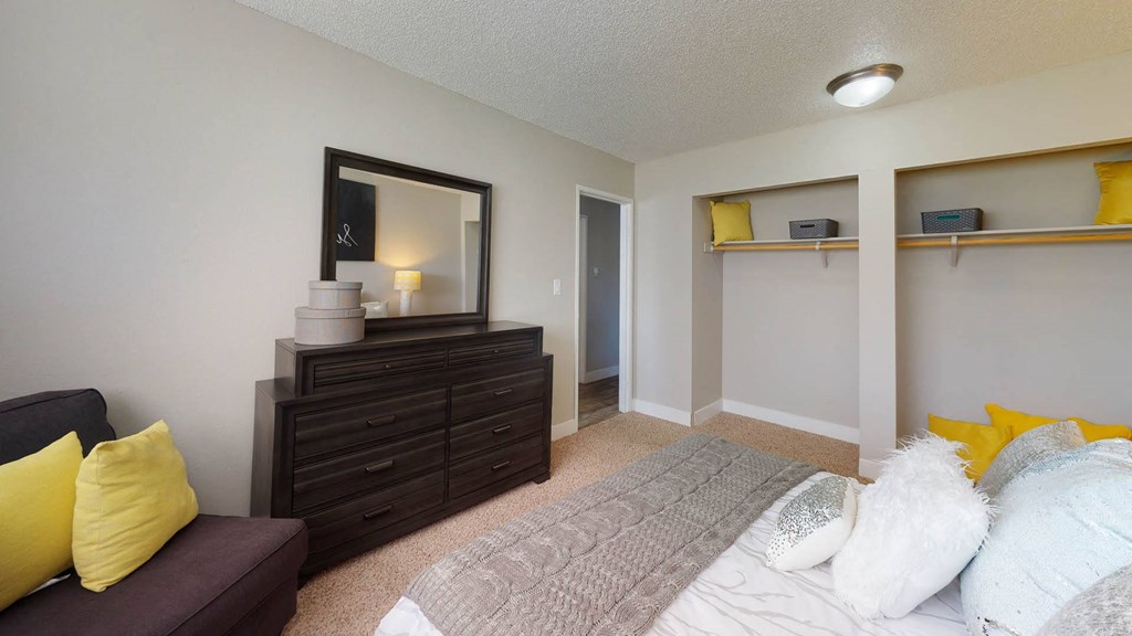 Bedroom with Closets at Spyglass Creek, Denver