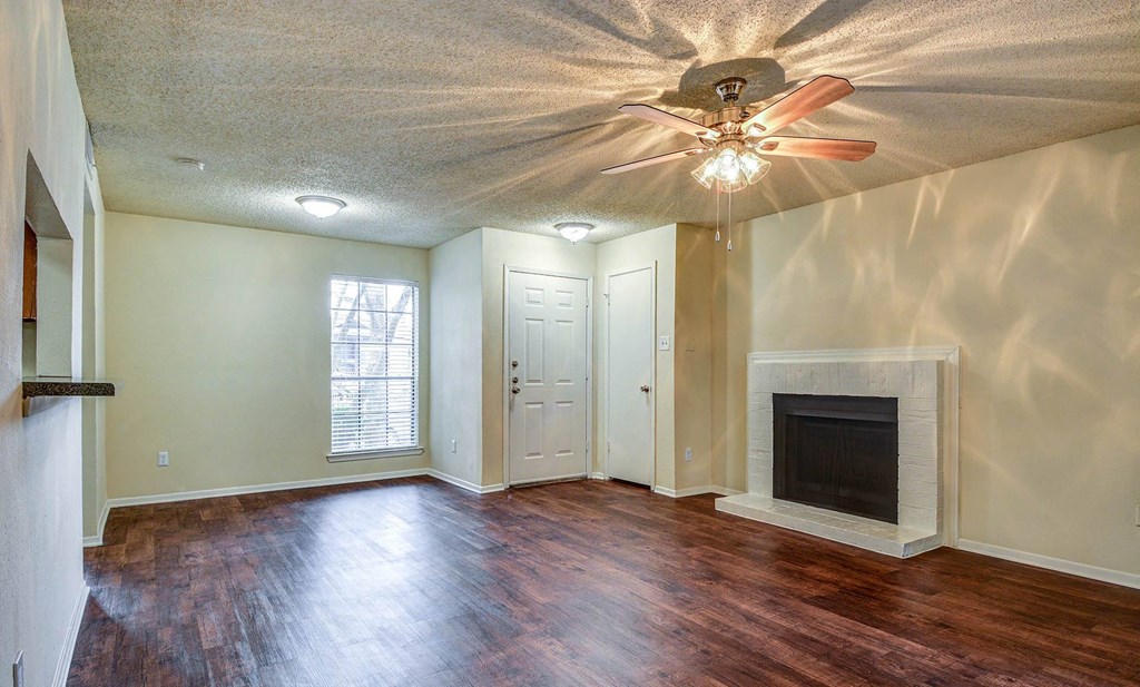 Living Room with Fireplace at The Glen, Lewisville, TX
