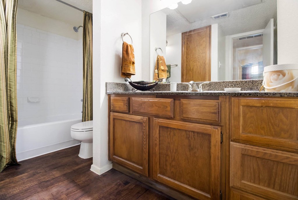 Renovated Bathrooms With Quartz Counters at The Glen, Texas