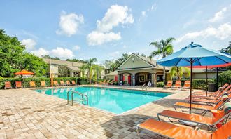 Poolside Sundeck at University Park Apartments, Orlando, FL, 32817 - Photo Gallery 3