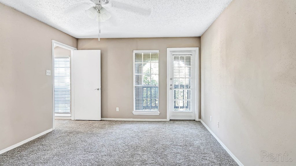 Bedroom with Ceiling Fan at The Willows on Rosemeade, Dallas, TX