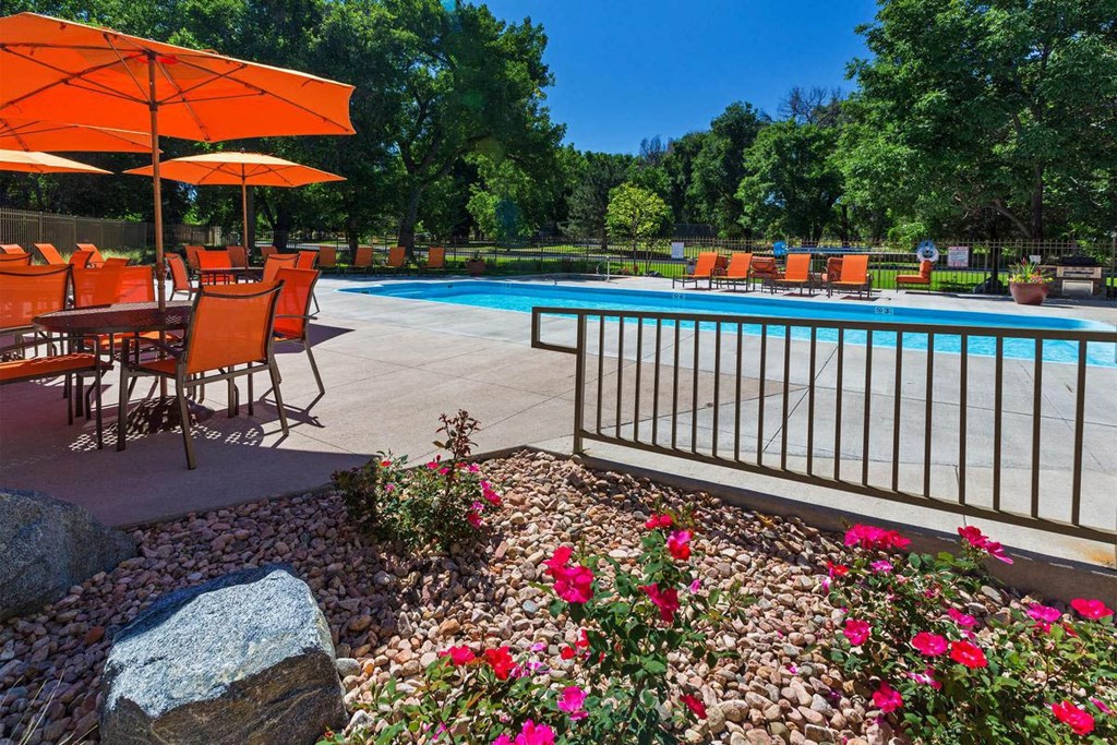 Poolside Sundeck With Relaxing Chairs at Woodland Hills Apartments, Colorado