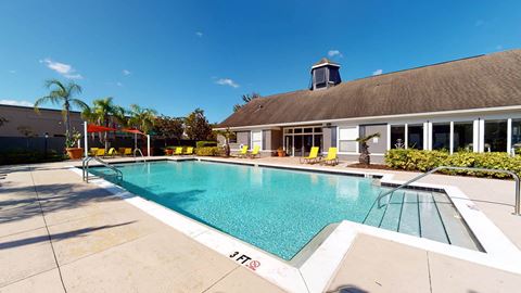Swimming Pool And Sundeck at The Arbor Walk Apartments, Florida
