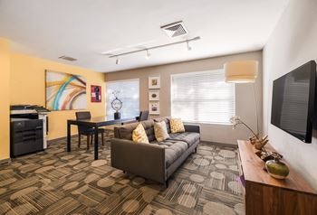 Living Room With TV at University Park Apartments, Orlando, 32817