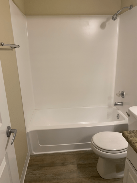 Bathroom with a Toilet and a Bathtub at Arcadia Townhomes, Federal Way, WA, 98023