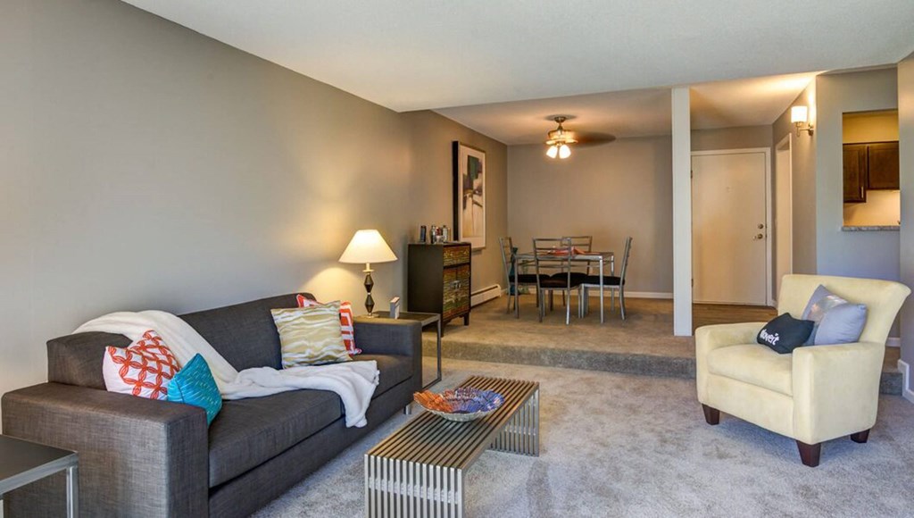Living Area With Kitchen View at Glen at Burnsville, Burnsville
