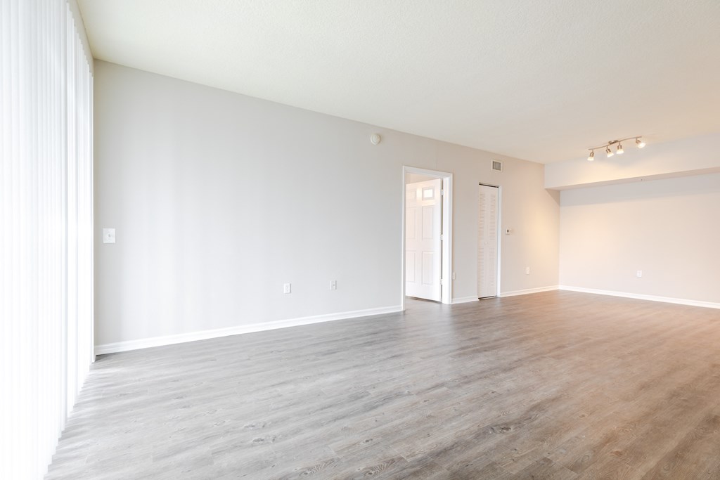 a bedroom with hardwood flooring at the oxford at estonia apartments in san an at Heritage Bay, Florida, 34957