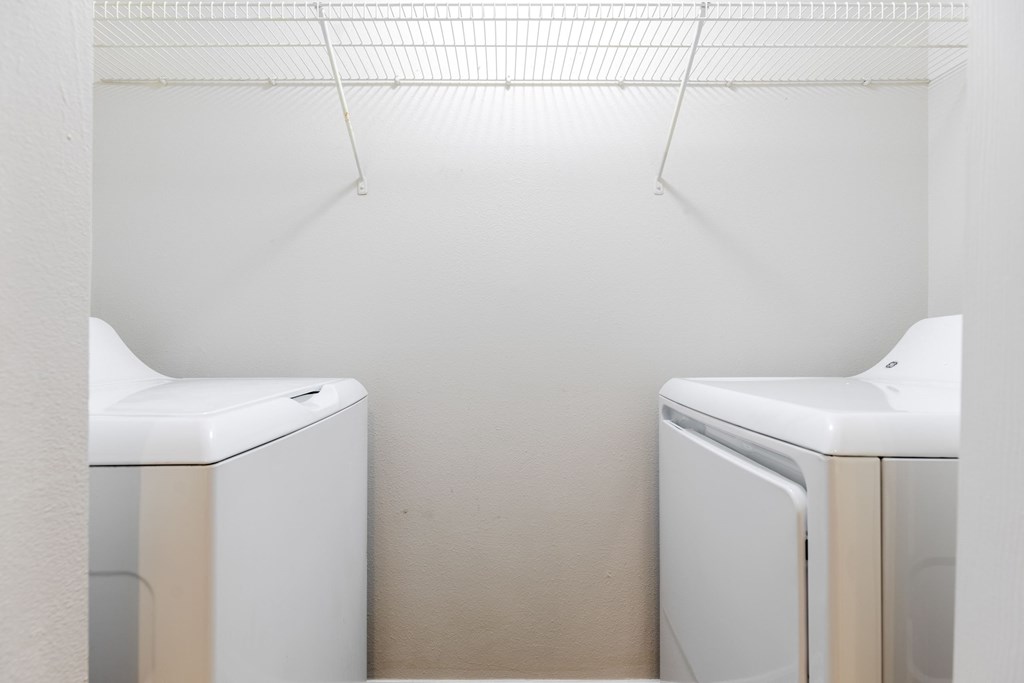a washer and dryer in a laundry room at Heritage Bay, Jensen Beach Florida