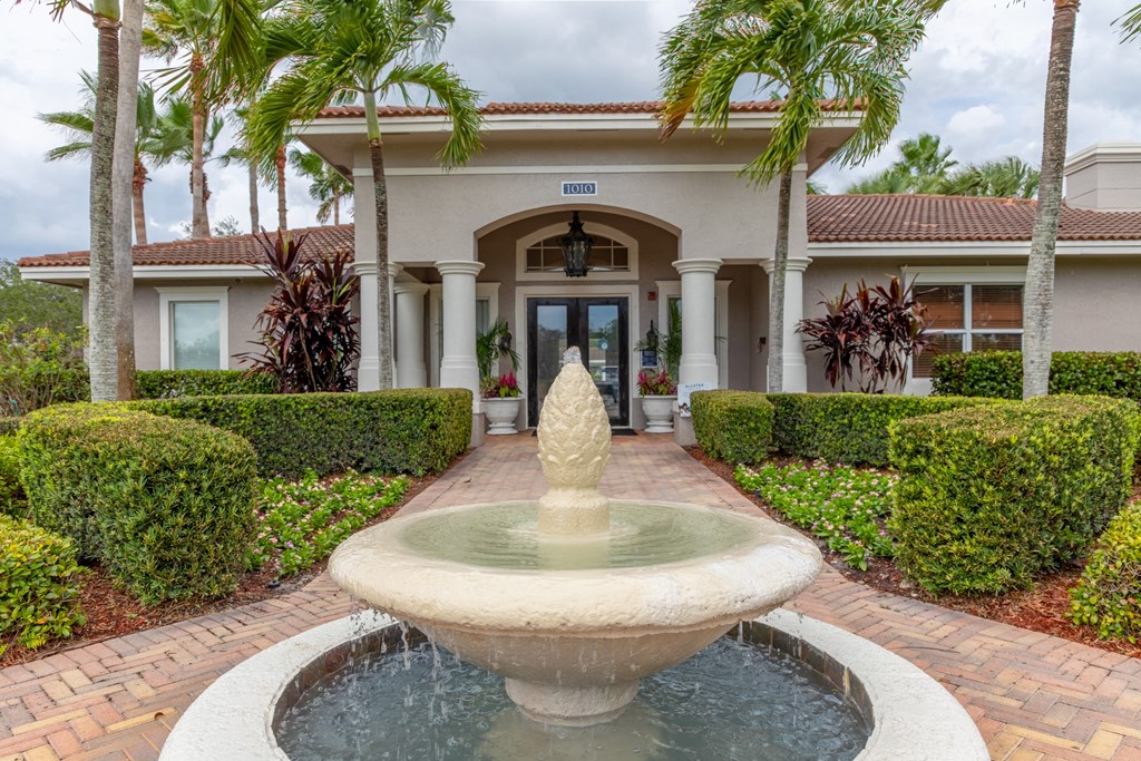 a fountain in front of a house at Heritage Bay, Jensen Beach, FL 34957