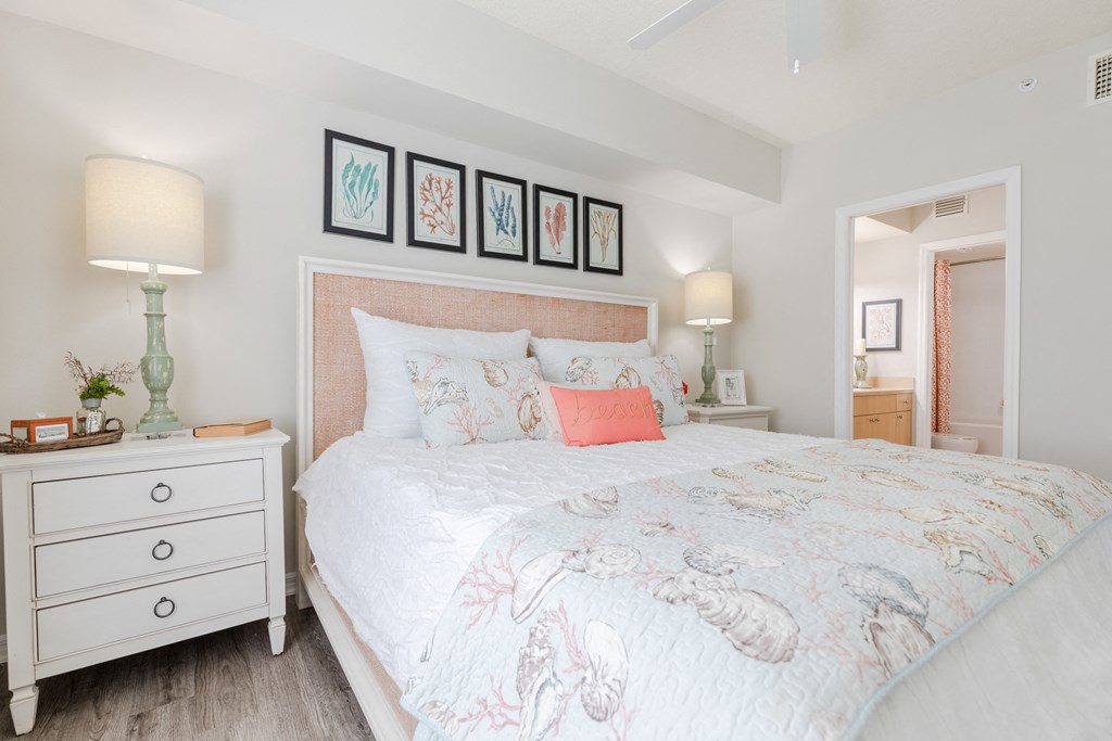 a bedroom with a bed and two night stands at Heritage Bay, Florida