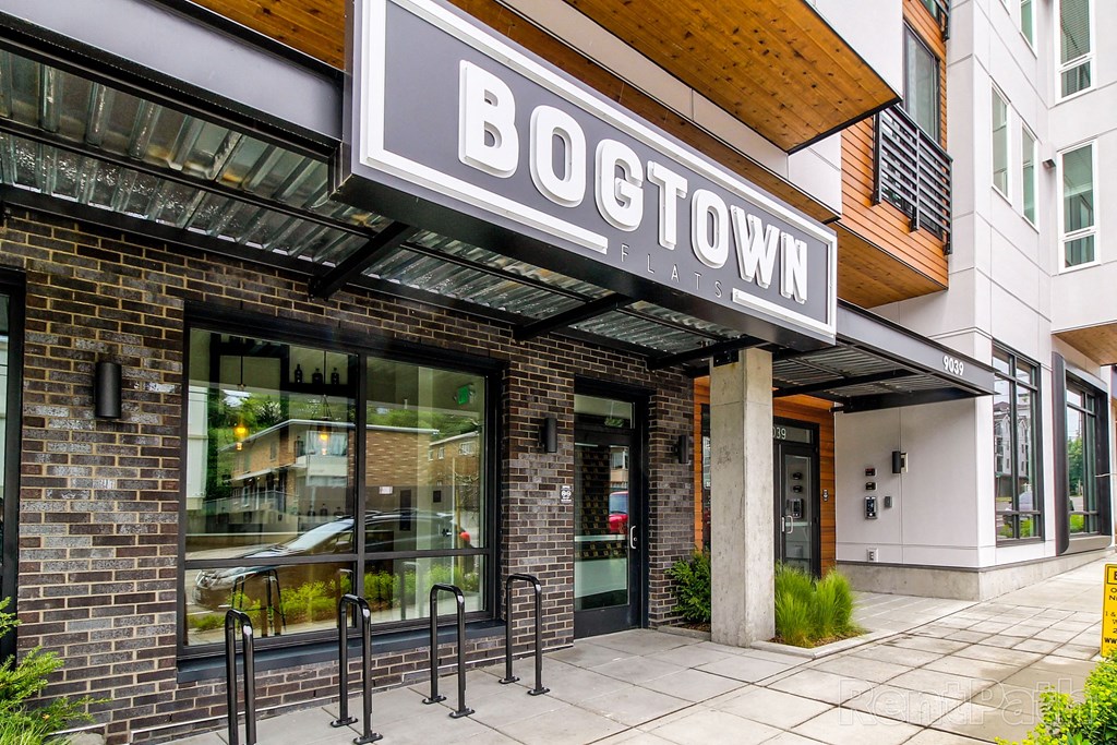 the front of a building with a sign that reads