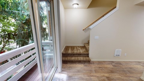 a view of a staircase in a building with colorful walls