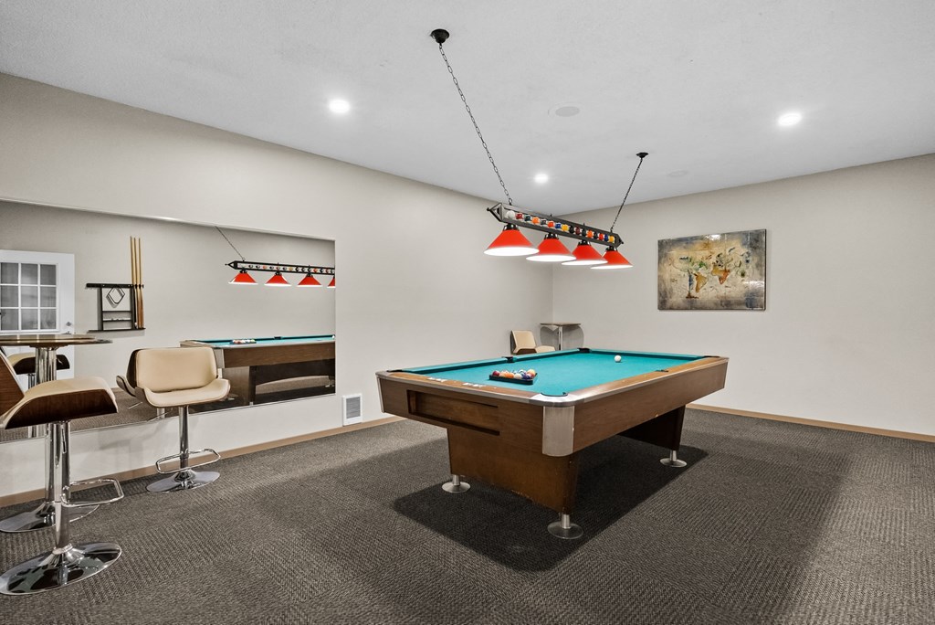 the preserve at ballantyne commons game room with pool table and bar