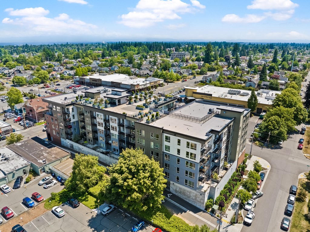 an aerial view of an apartment building in a city
