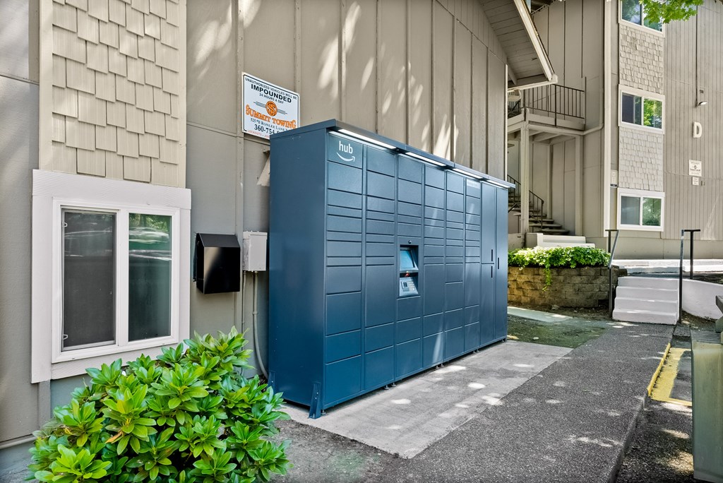 a small blue box on the side of a building