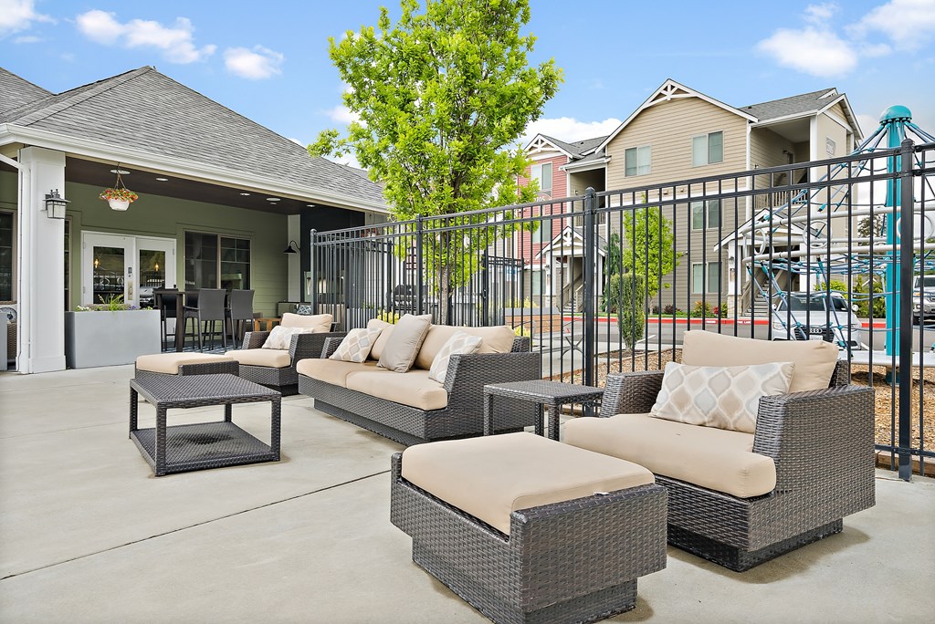 the terrace with couches and tables at the choices at trillium apartments