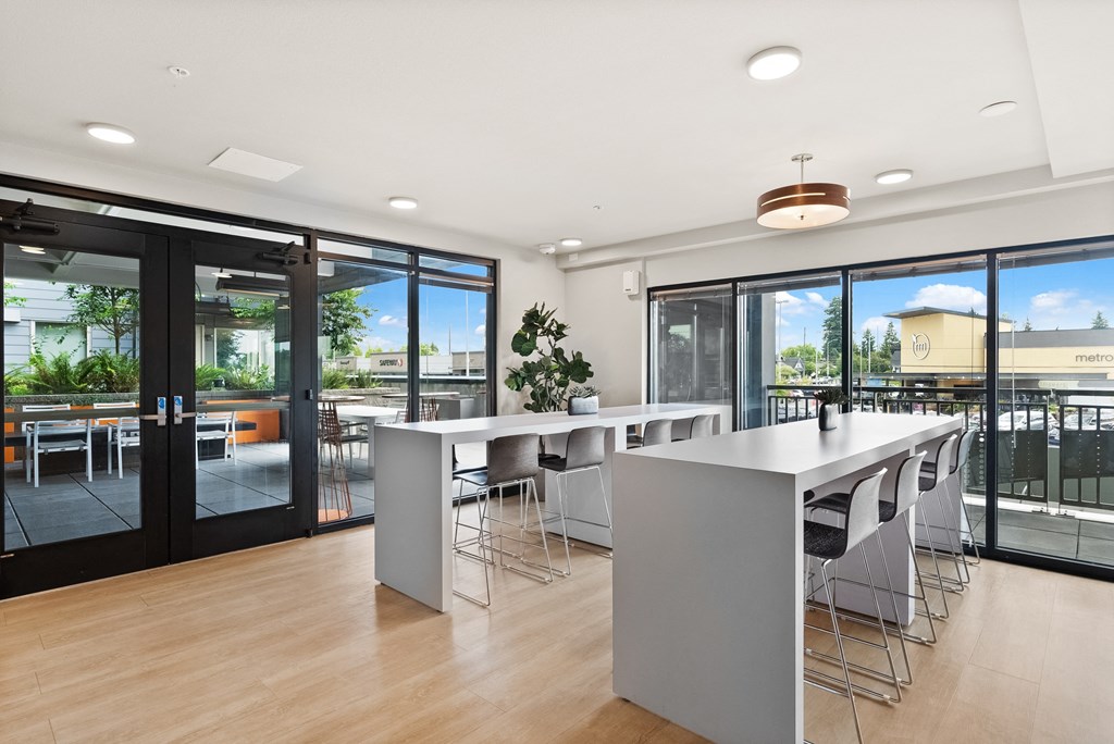 the preserve at ballantyne commons cyber cafe with a large white table and chairs