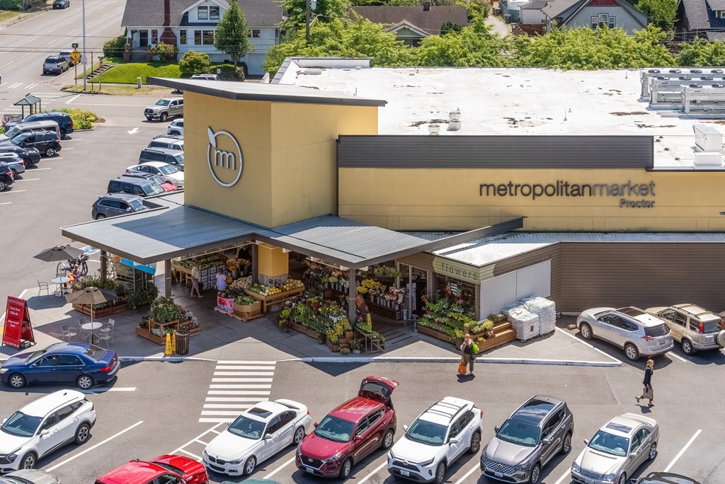 an aerial view of a metropolis market store in a parking lot