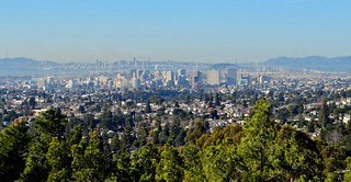 a view of the city from a hill