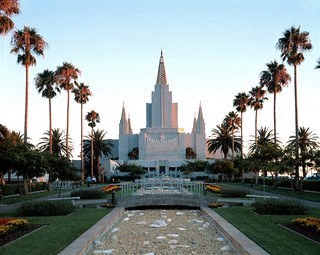 the temple of the church of jesus christ of scientology with palm trees