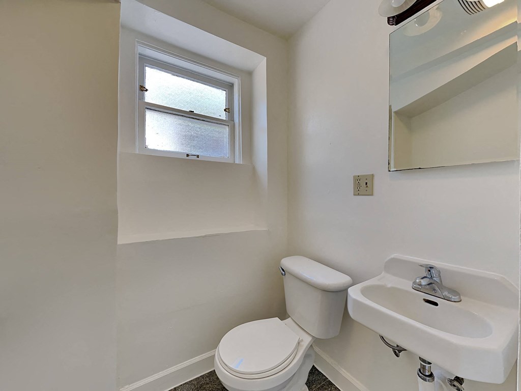 a small bathroom with a toilet and a sink