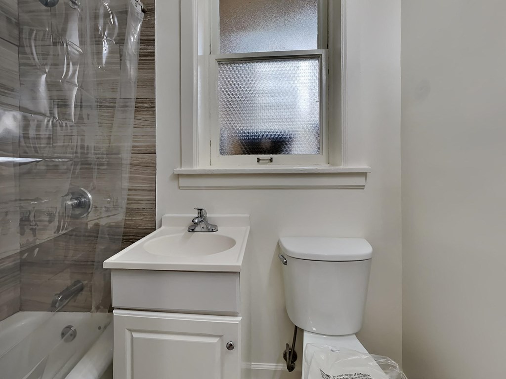 a small bathroom with a toilet and a sink