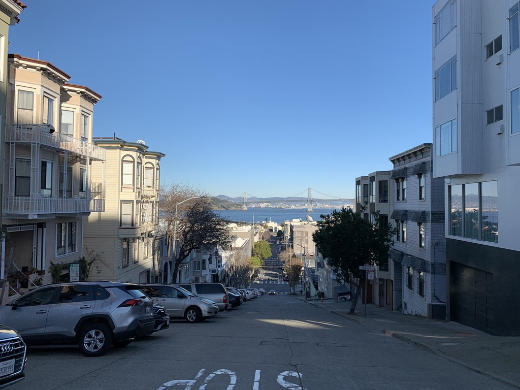 a view of the bay bridge from a street