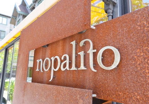 a sign on the side of a building that says