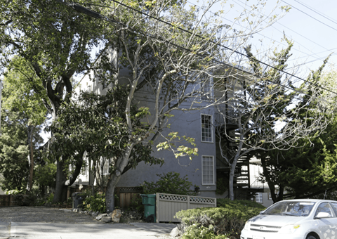 a house with a car parked in front of it