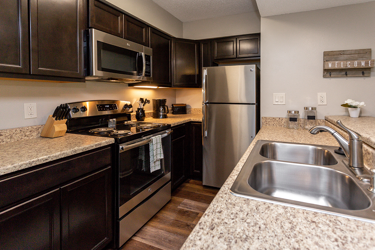 kitchen with moden appliances and sleek countertops