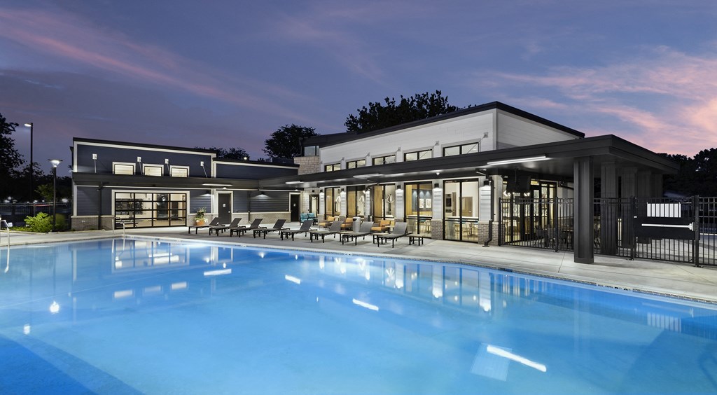 resort-style saltwater pool connected to modern clubhouse