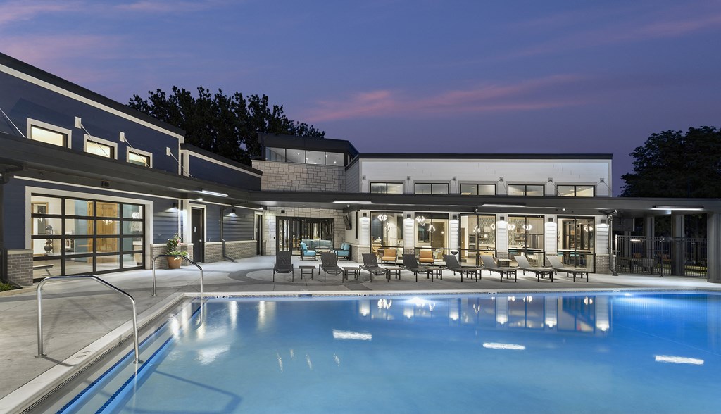 pool in the evening with exterior seating