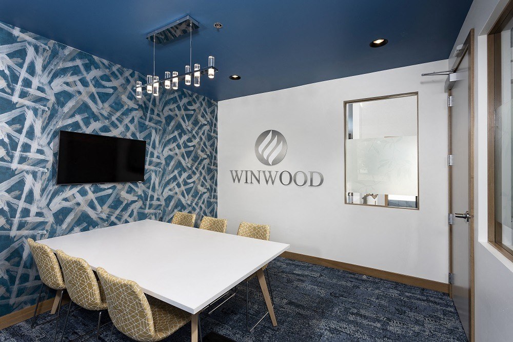 small conference room with tv and table