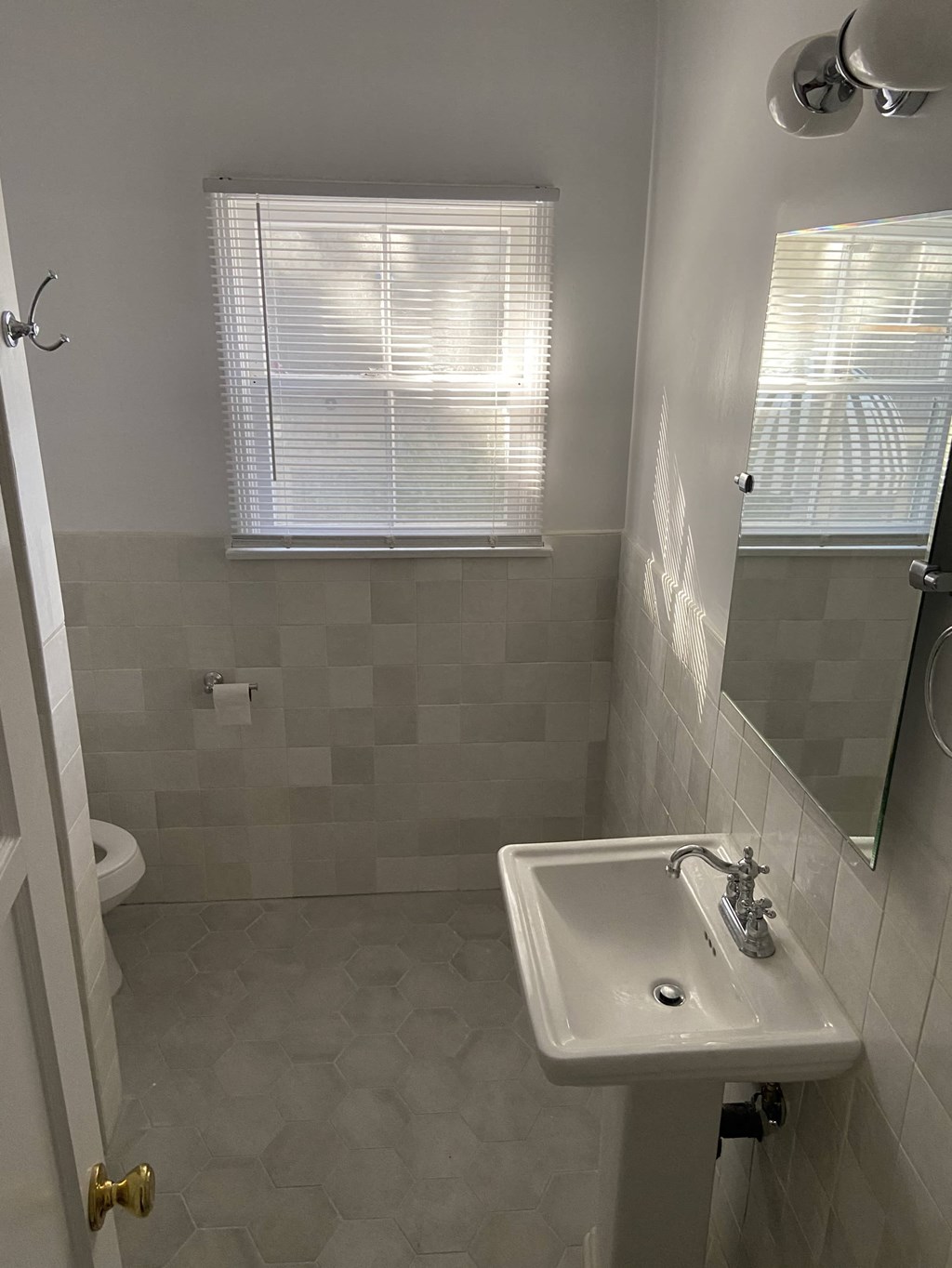 a small bathroom with a sink and a toilet