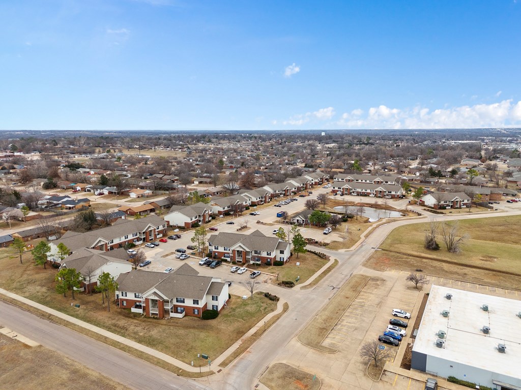 an aerial view of a neighborhood of houses in a city