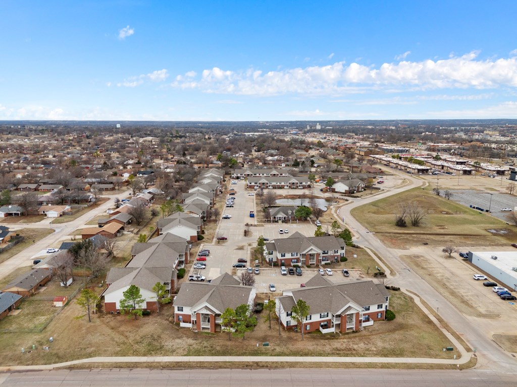 an aerial view of a neighborhood of houses in a city