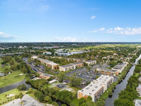 a blue and yellow geometric pattern on the floor at Cypress Grove, Lauderhill, FL, 33313