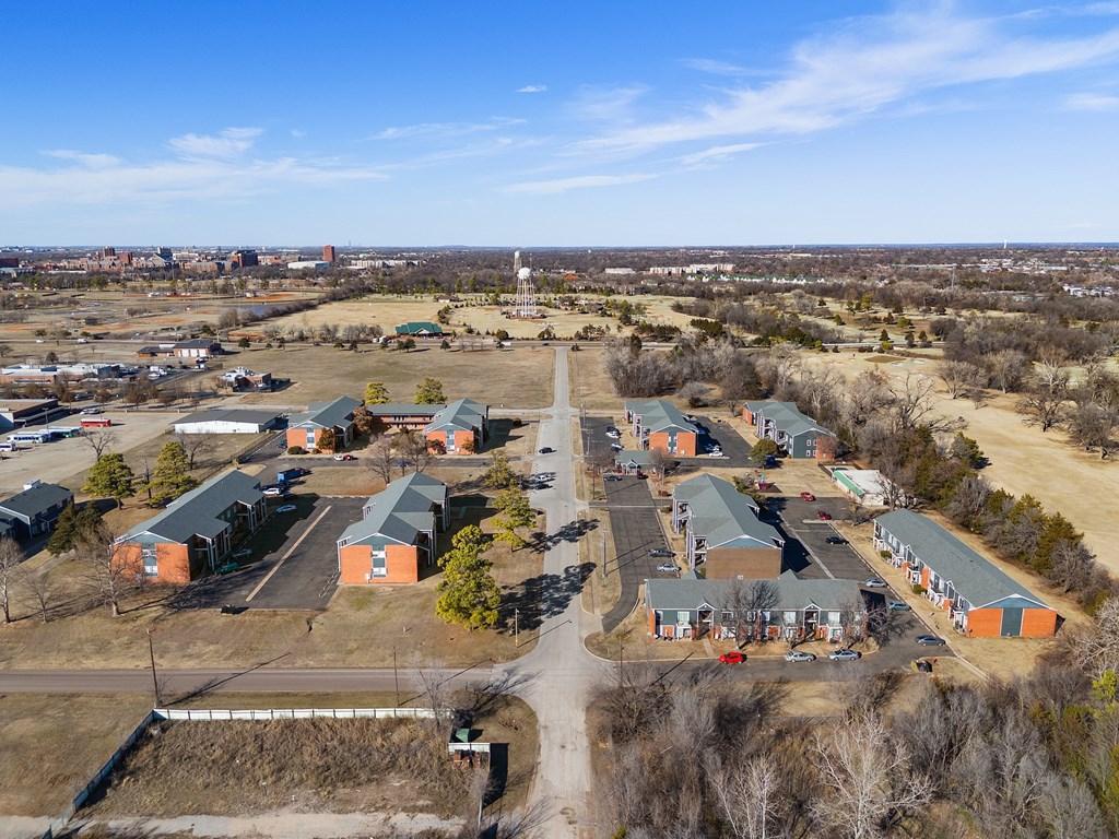 a aerial view of a neighborhood of houses and a road