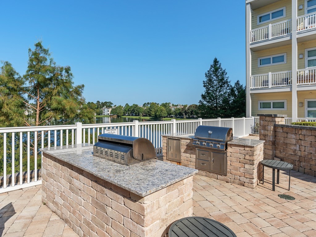 barbecue grill and seating area at Lake Lofts at Deerwood, Florida, 32216