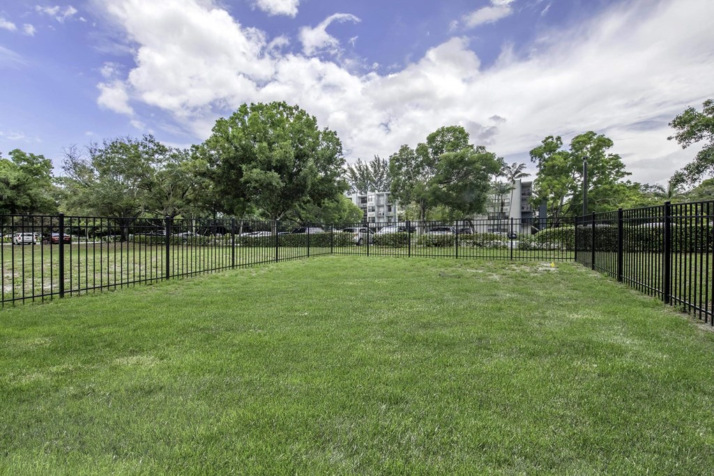 a large grassy area with a fence around it  at Club at Emerald Waters, Florida
