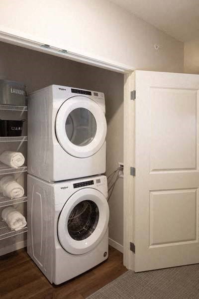 a washer and dryer are in a laundry room