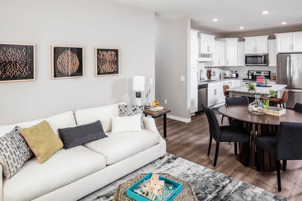 a living room with a couch and a table