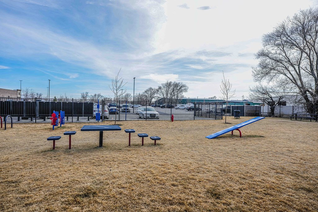 a park with a playground and benches