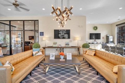 a living room with couches and a coffee table