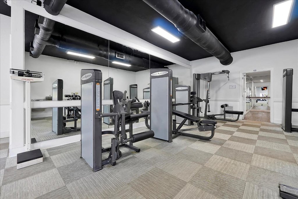 the gym at the flats at big tex apartments