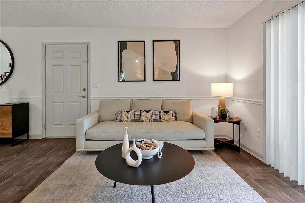 a living room with a couch and a coffee table