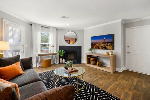 a living room with a couch and a table