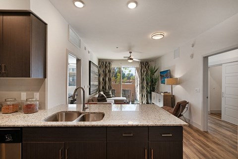 a kitchen with a sink and a counter top